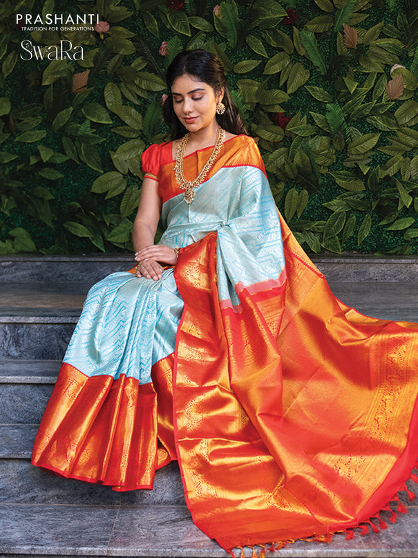Pure kanjivaram silk saree light blue and red with allover silver zari woven brocade weaves and zari woven border