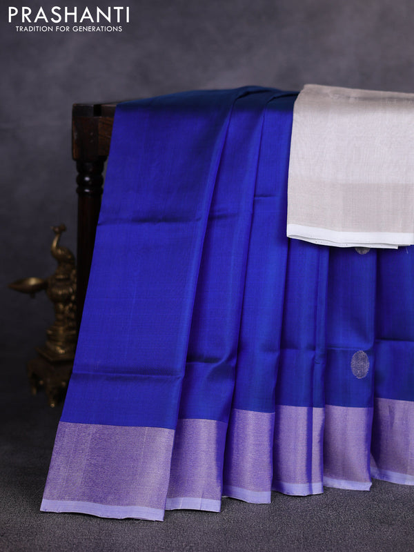 Pure uppada silk saree blue with allover silver zari woven coin buttas and zari woven border