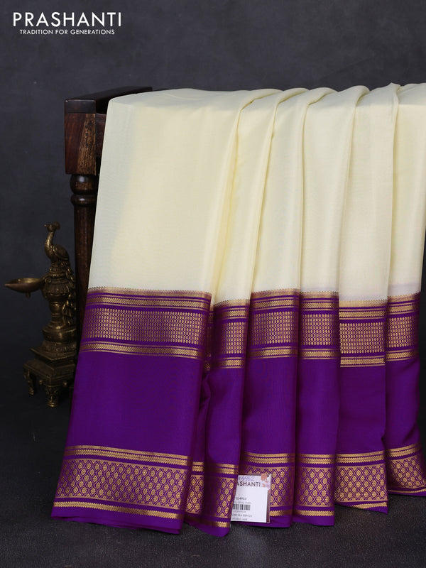 Pure mysore silk saree cream and purple with plain body and rettapet zari woven border