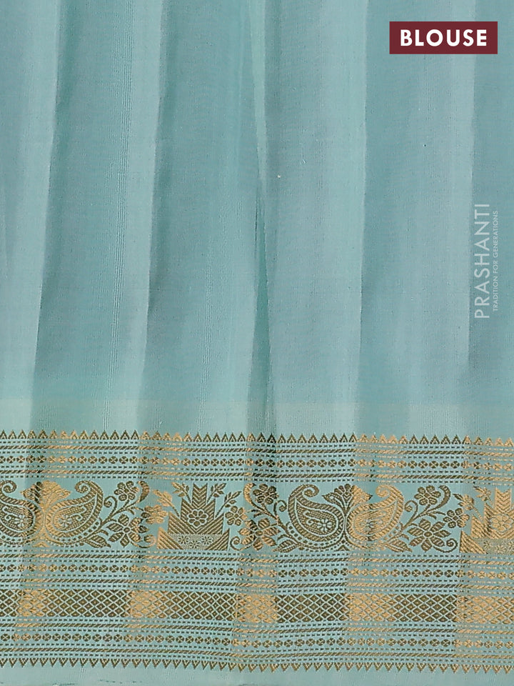 Pure gadwal silk saree black and teal green shade with silver & gold zari woven buttas and temple design zari woven border