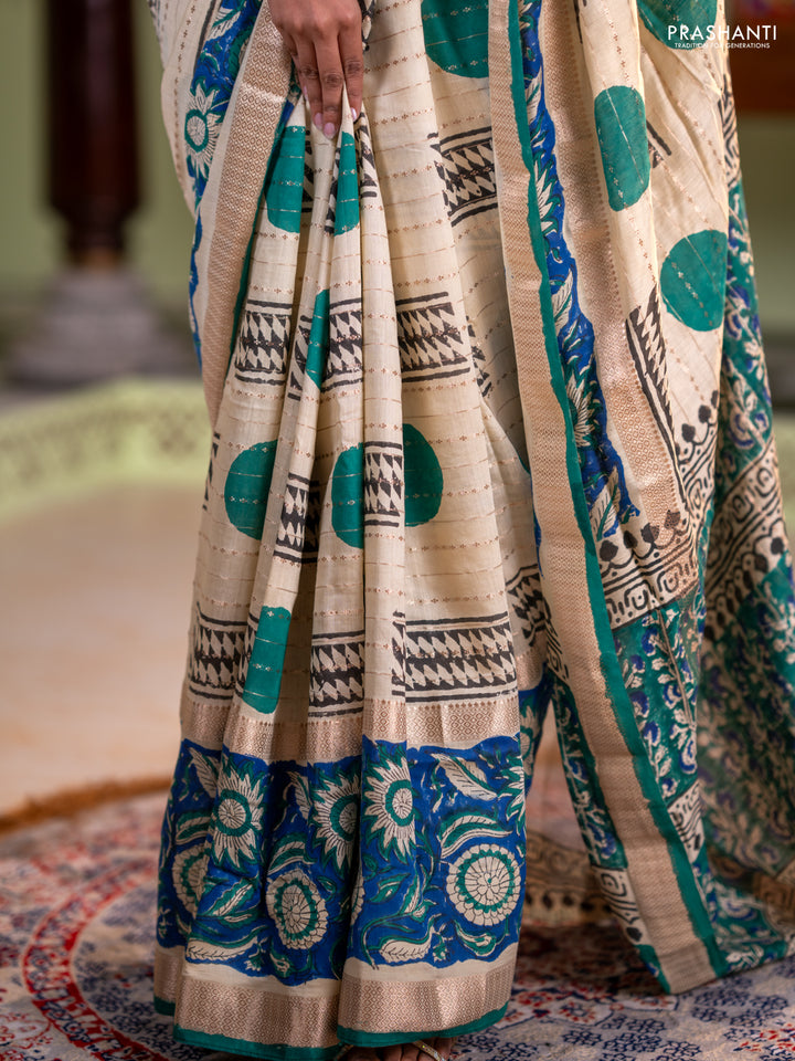 Semi chanderi saree cream and blue with allover zari weaves & geometric block prints and long printed border