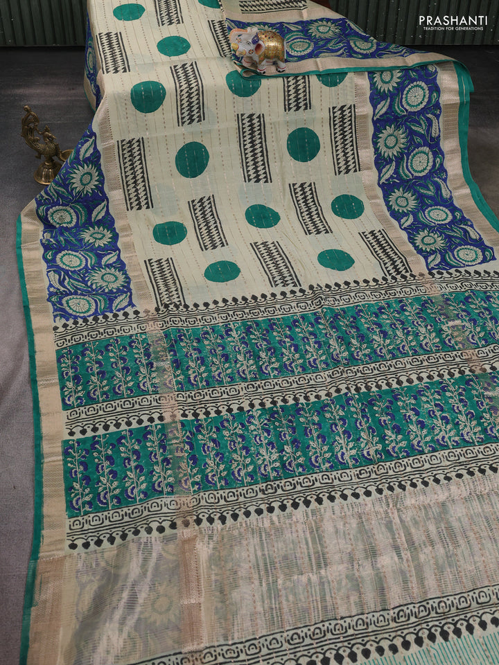 Semi chanderi saree cream and blue with allover zari weaves & geometric block prints and long printed border