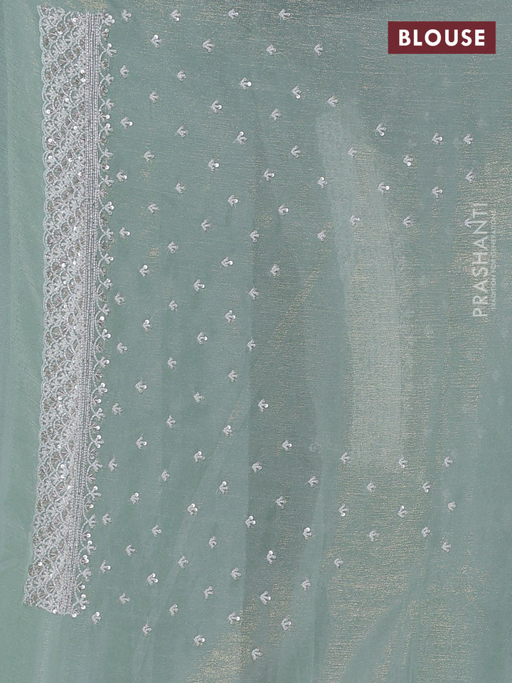 Crush tissue saree pastel green with beaded work and sequin & cut beaded work border