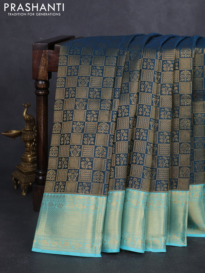 Pure kanchipuram silk saree peacock green and teal blue with allover zari woven brocade weaves and rich zari woven border