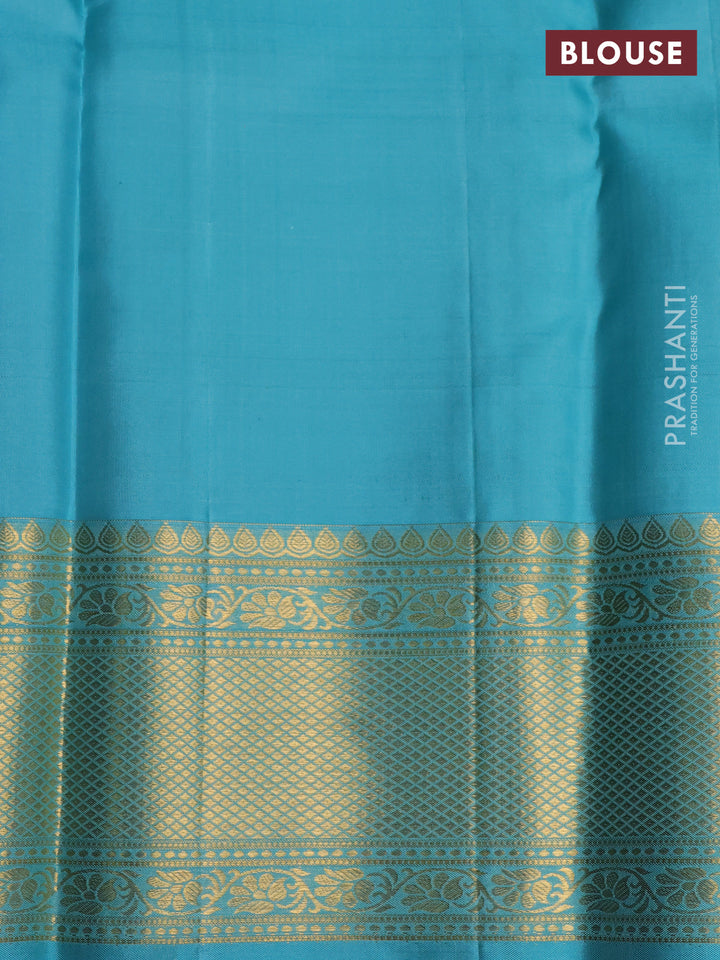 Pure kanchipuram silk saree peacock green and teal blue with allover zari woven brocade weaves and rich zari woven border