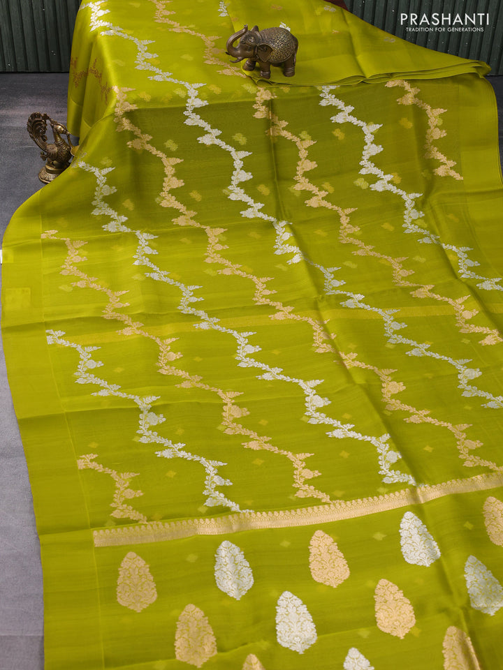 Banarasi organza silk saree light green with allover silver & gold zari weaves and simple border