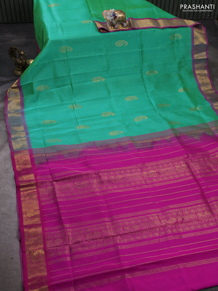 Silk cotton saree dual shade of green shade and pink with paisley zari woven buttas and zari woven border