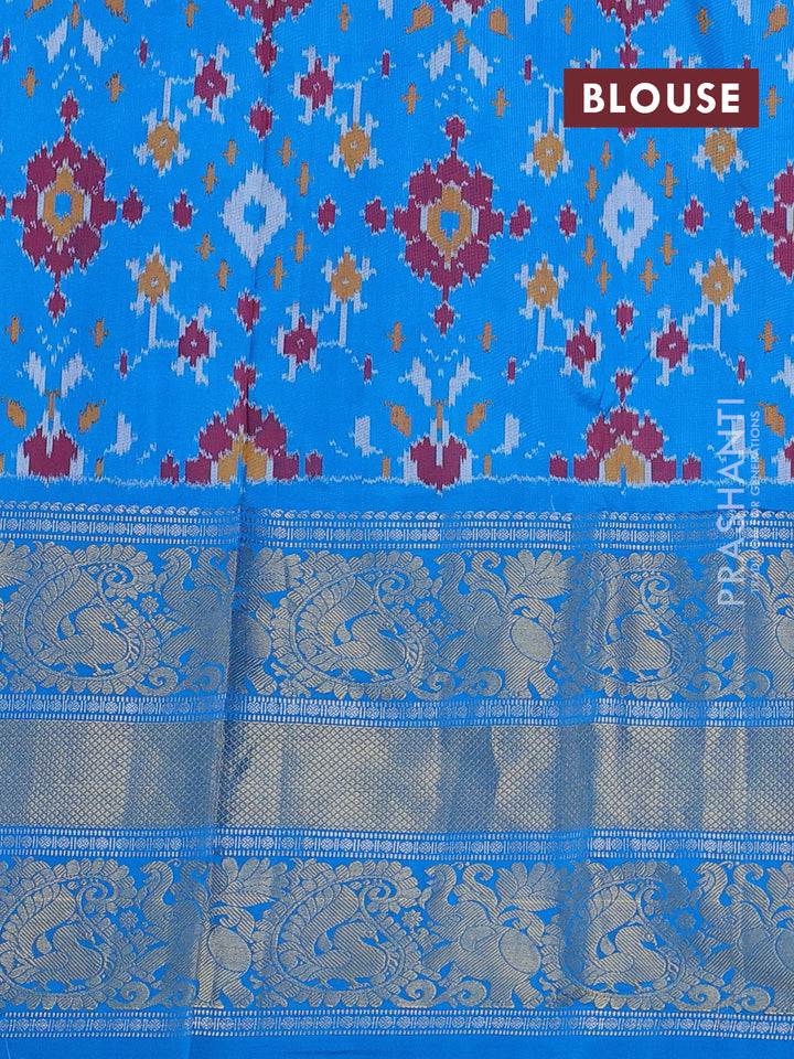 Pochampally silk saree grey and cs blue with allover ikat weaves and long silver & gold zari woven border