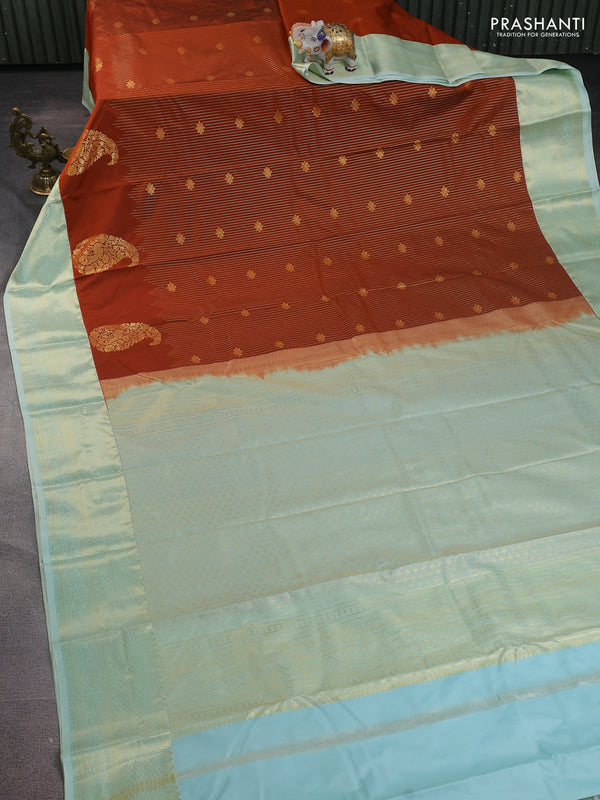 Bangalori silk saree rust shade and pastel green with allover zari stripe pattern and zari woven border
