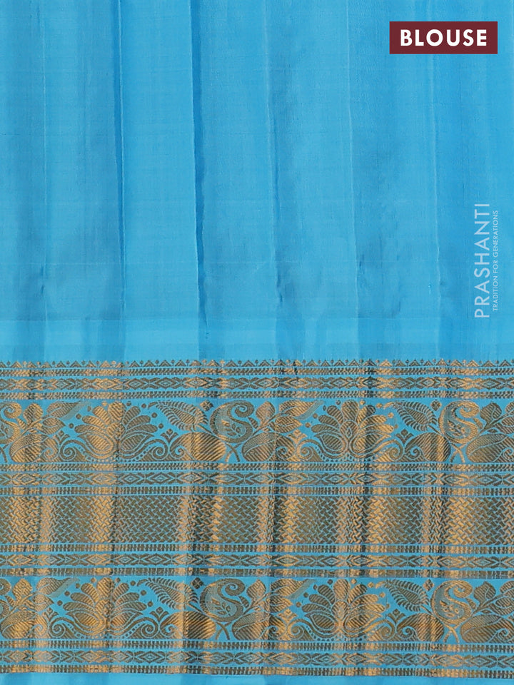 Pure gadwal silk saree blue and teal blue with zari woven buttas and temple design zari woven border