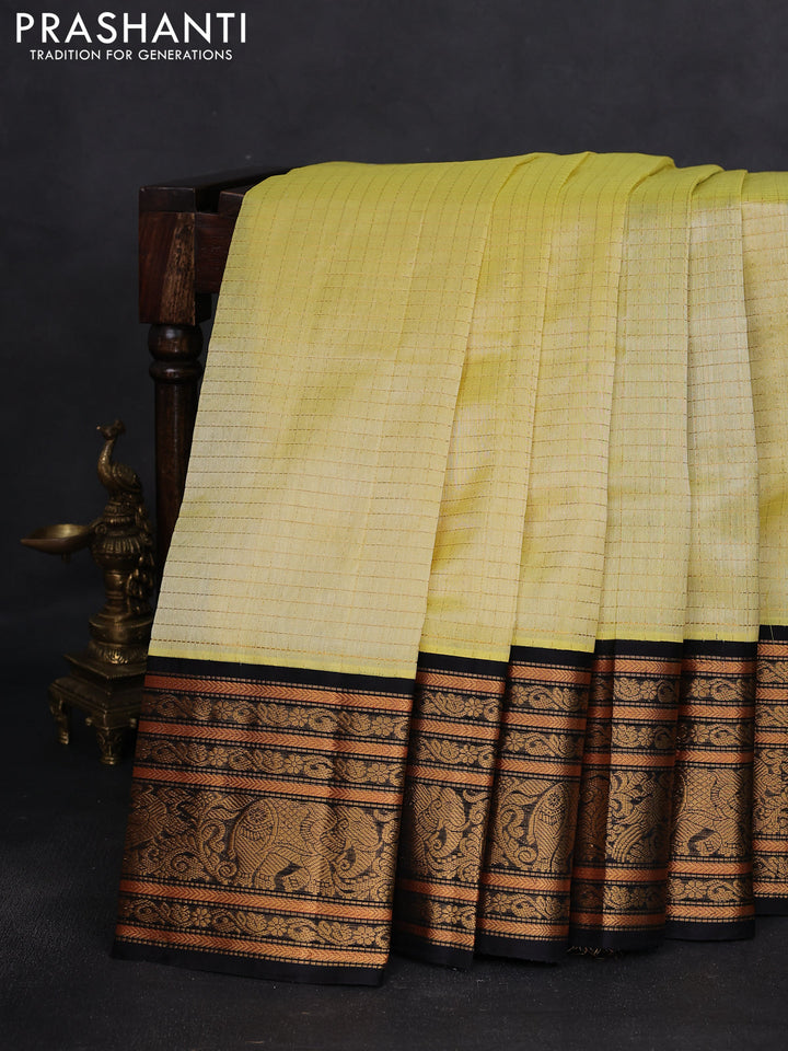 Kuppadam silk cotton saree lime yellow and black with allover zari woven checked pattern and long zari woven border