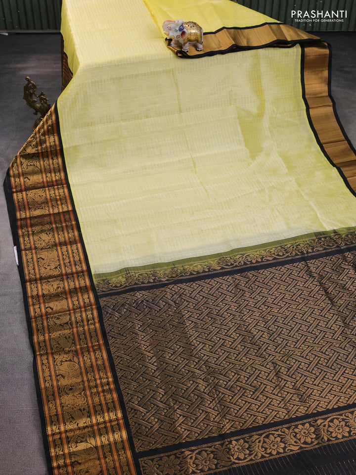 Kuppadam silk cotton saree lime yellow and black with allover zari woven checked pattern and long zari woven border