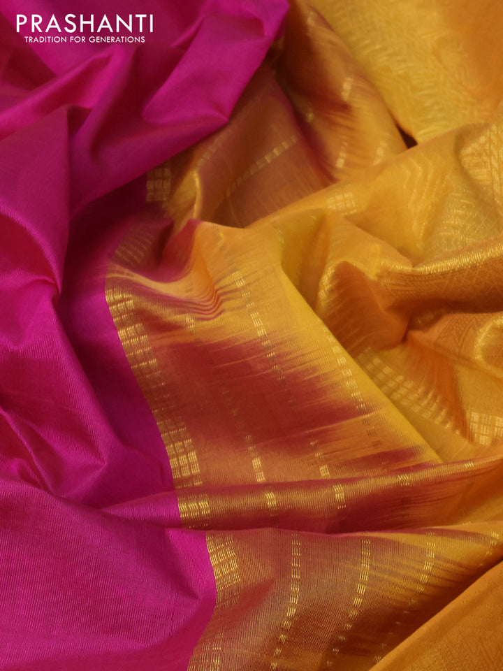Silk cotton saree magenta pink and mustard yellow with plain body and temple design zari woven border