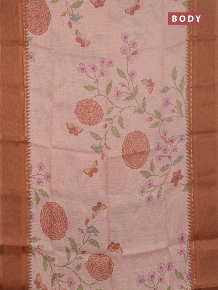 Art Linen saree pale orange and rust shade with allover floal prints and temple design rettapet zari woven border