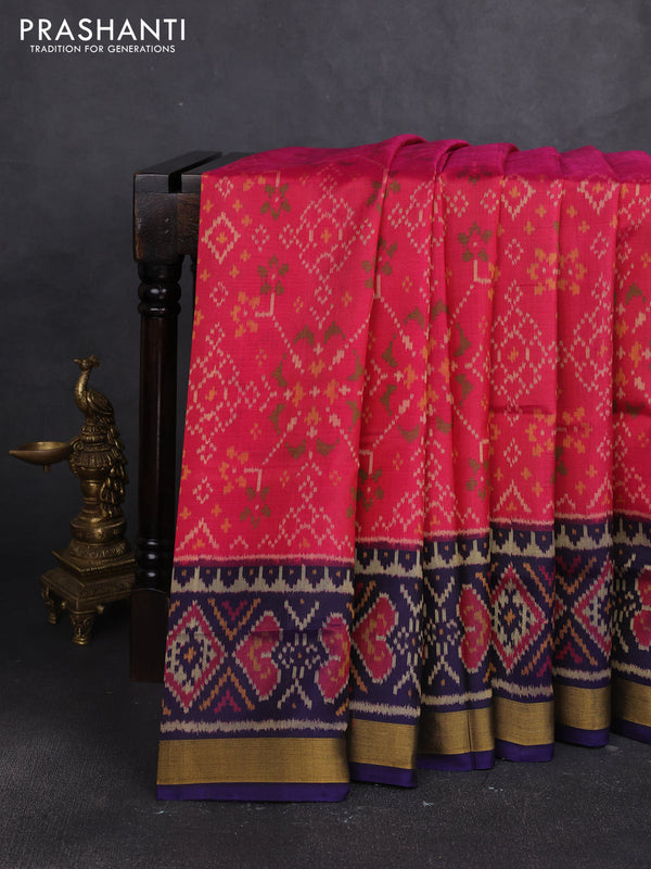 Rajkot patola silk saree peach pink and navy blue with allover ikat weaves and zari woven border