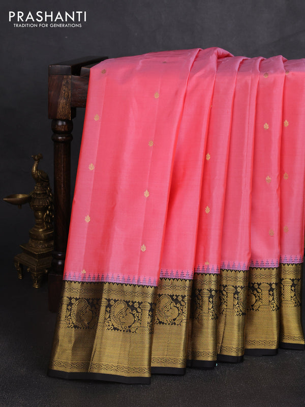 Pure gadwal silk saree peach pink and black with zari woven buttas and temple design zari woven border