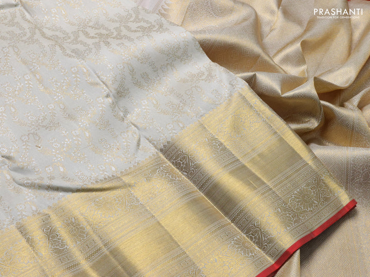Pure kanchipuram silk saree cream and red with allover zari woven brocade weaves and long zari woven border