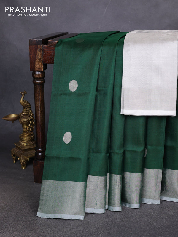 Pure uppada silk saree green with allover silver zari coin buttas and silver zari woven border