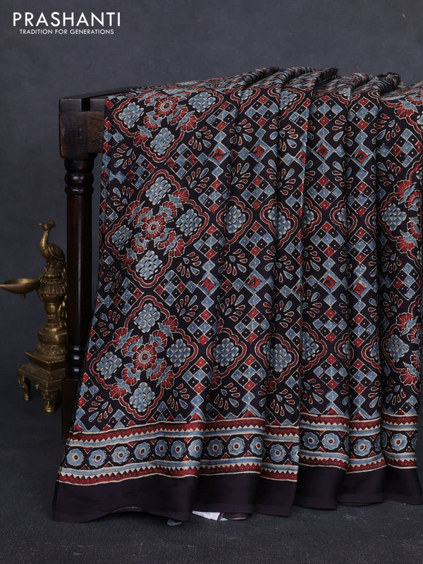 Modal Silk Saree black with allover ajrakh prints and printed border