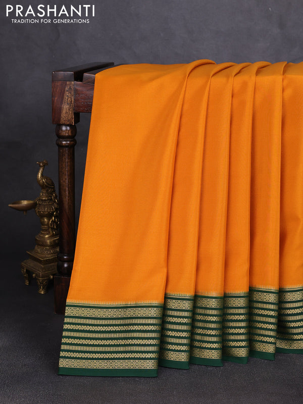 Pure mysore silk saree dark mustard and bottle green with plain body and zari woven border
