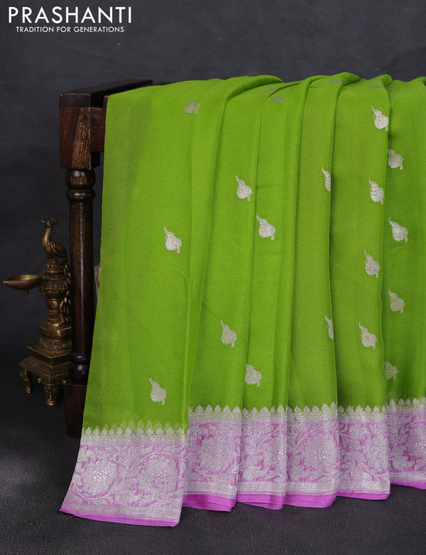 Banarasi chiffon saree light green and lavender with allover silver zari woven buttas and silver zari woven floral border