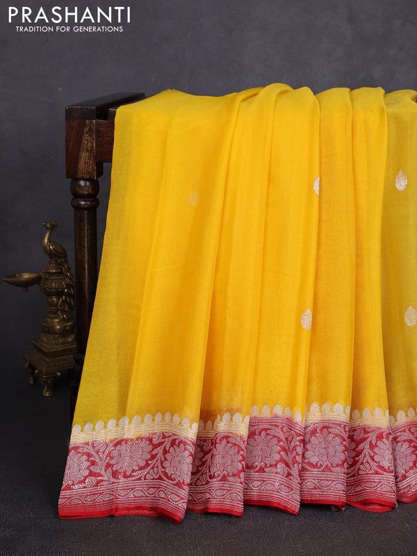 Banarasi chiffon saree mango yellow and red with allover silver zari woven buttas and silver zari woven floral border