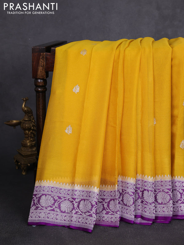 Banarasi chiffon saree yellow and purple with allover silver zari woven buttas and silver zari woven floral border