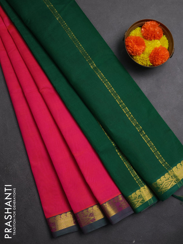 Silk cotton saree candy pink and green with plain body and zari woven border