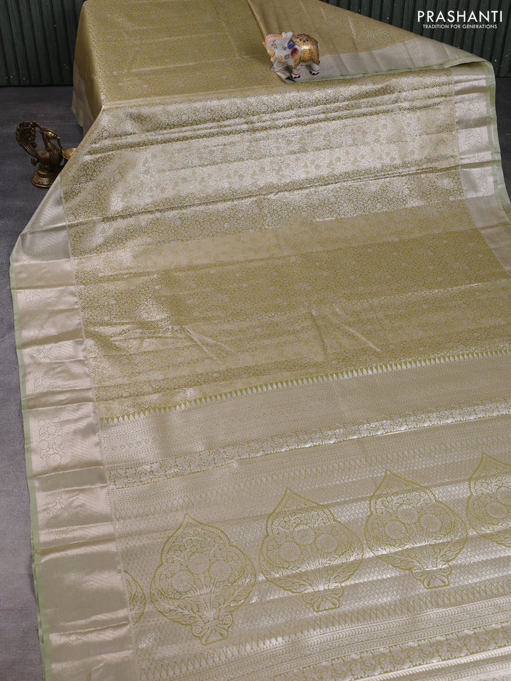 Bangalori tissue silk saree mehendi green with allover zari woven brocade weaves and long zari woven border