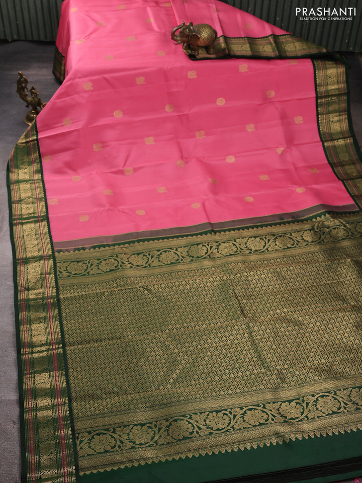 Pure kanchipuram silk saree light pink and bottle green with annam & rudhraksha zari woven buttas and rich zari woven peacock border