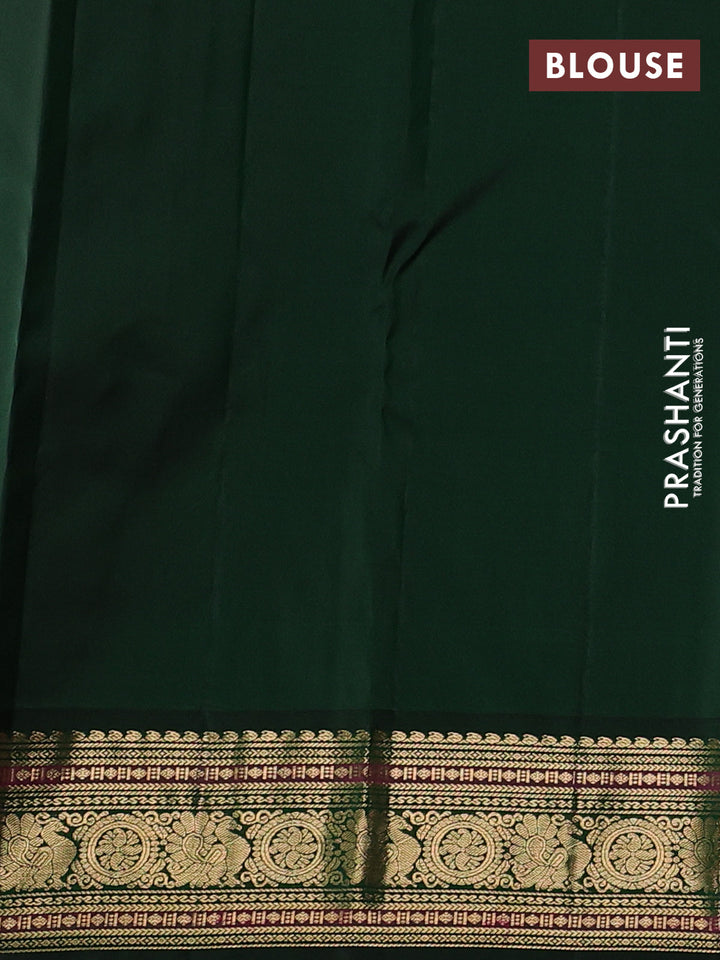 Pure kanchipuram silk saree light pink and bottle green with annam & rudhraksha zari woven buttas and rich zari woven peacock border