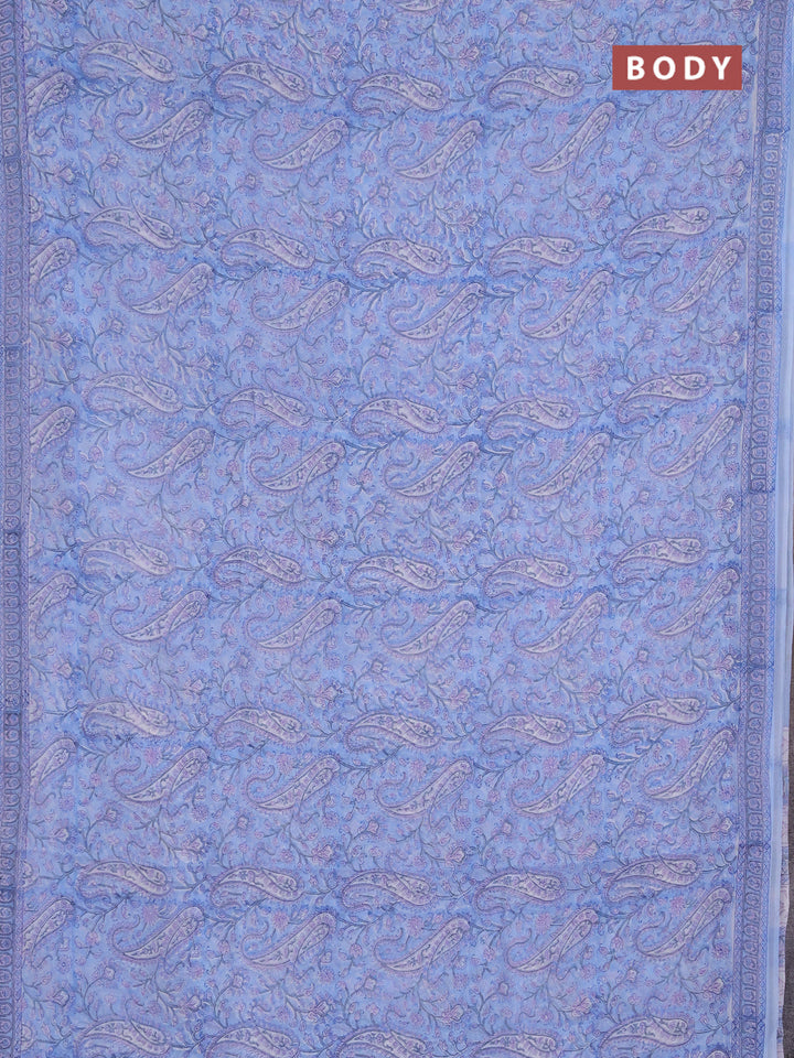 Georgette saree light blue and off white with allover block prints and printed border