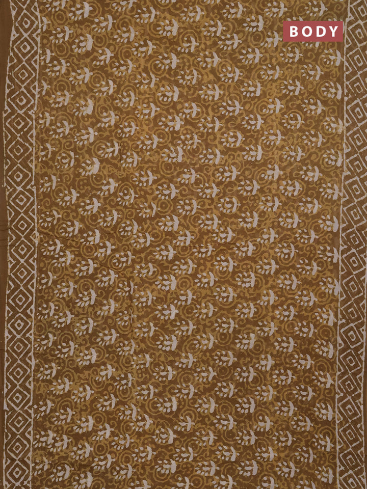 Georgette saree khaki shade with allover dabu prints and printed border