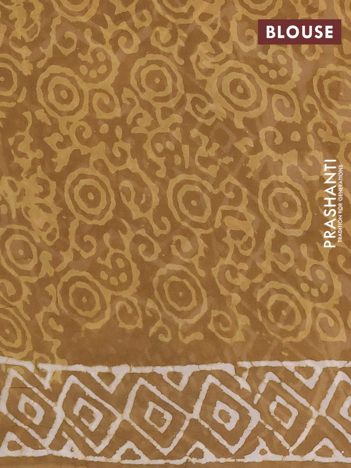 Georgette saree khaki shade with allover dabu prints and printed border