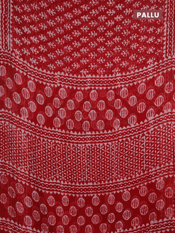 Georgette saree rustic orange with allover dabu prints and printed border
