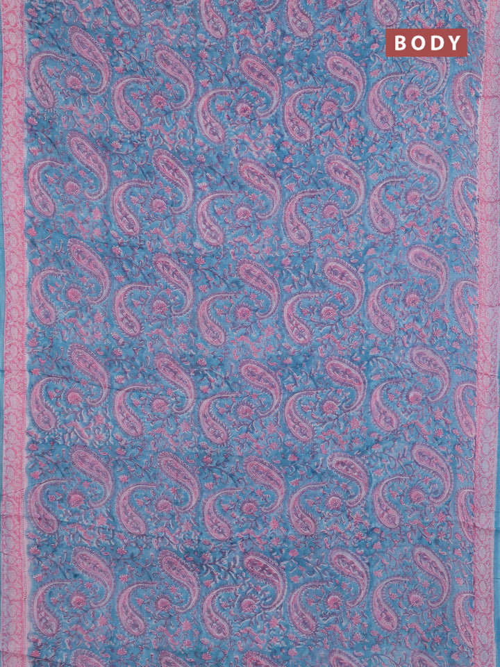Georgette saree teal blue and light pink with allover block prints and printed border