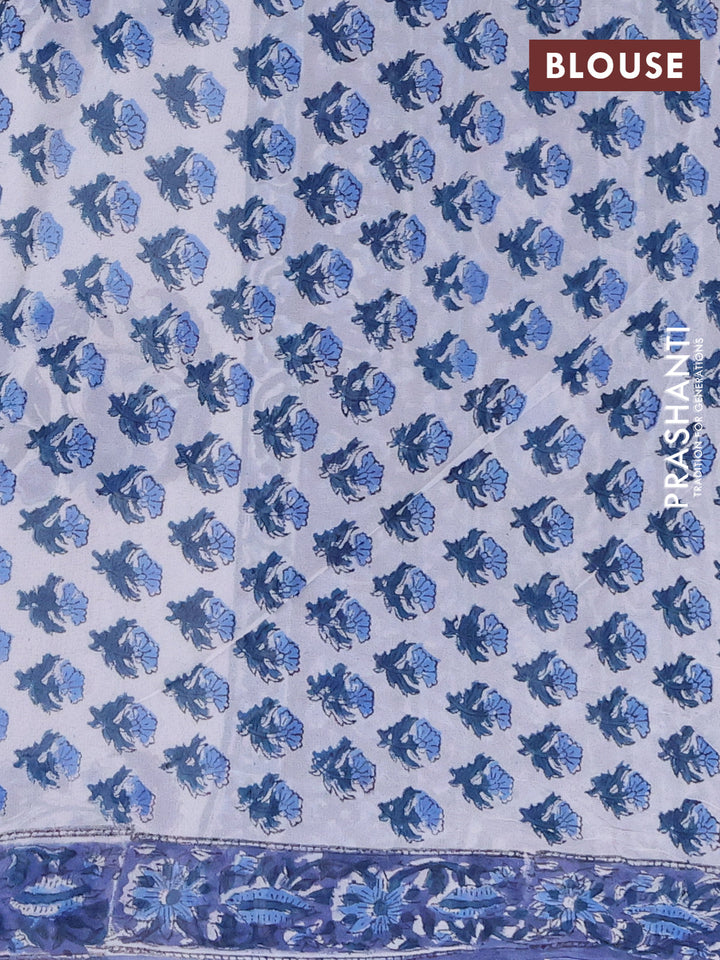 Georgette saree blue with allover block prints and printed border