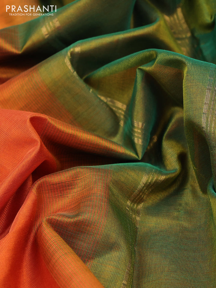 Silk cotton saree orange and green shade with plain body and small zari woven border