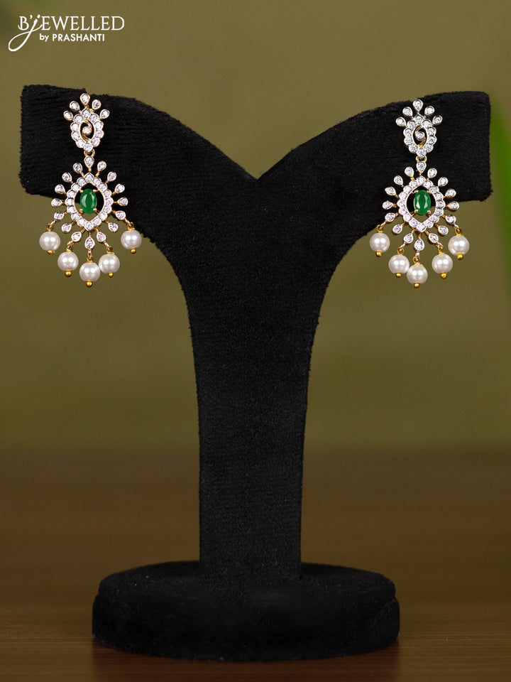 Zircon necklace with emerald & cz stones and pearl hangings in gold finish