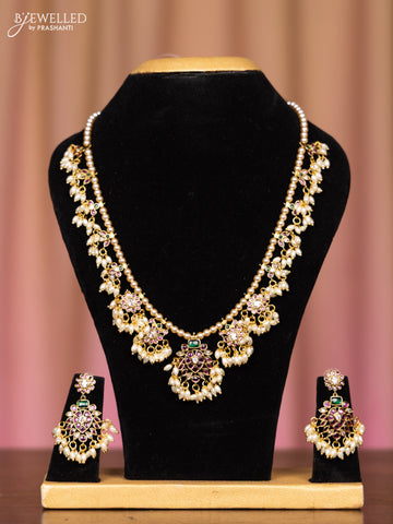 Pearl necklace with kemp and cz stones in pearl hangings