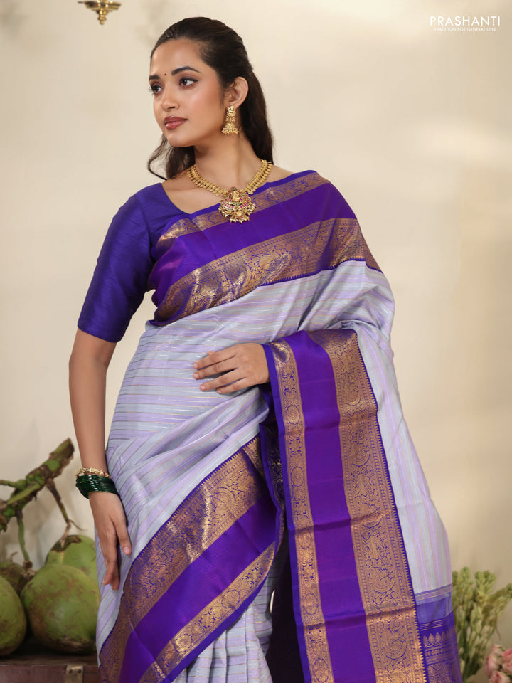 Pastel grey-Violet Pure Kanchipuram silk saree with allover stripes pattern & long zari woven border