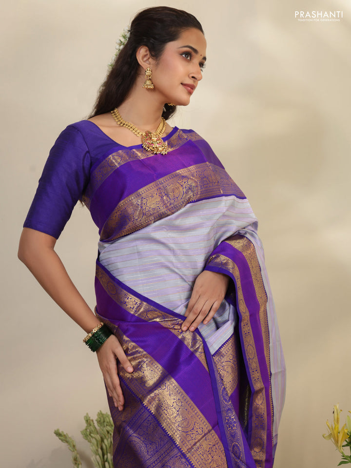 Pastel grey-Violet Pure Kanchipuram silk saree with allover stripes pattern & long zari woven border