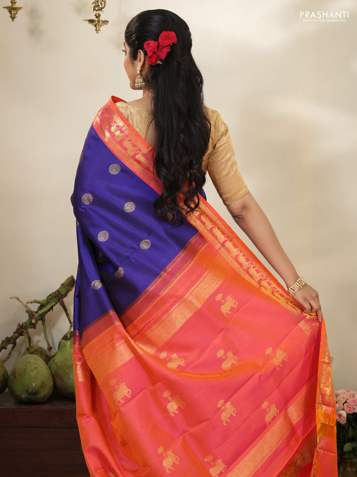 Blue-Dual shade of pinkish orange pure kanchipuram silk saree with zari woven buttas & zari woven border