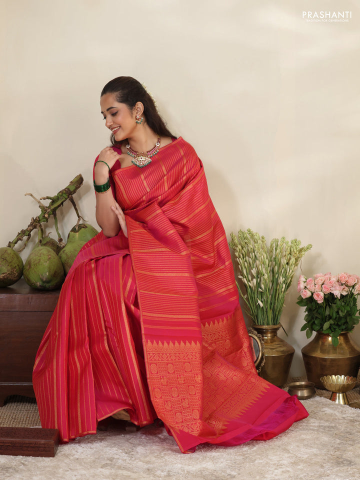 Pink pure kanchipuram silk saree with allover zari stripes pattern & in borderless style