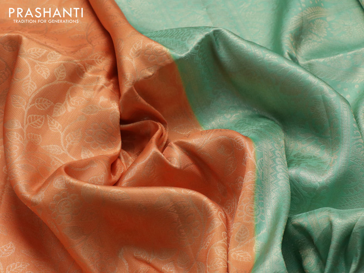 Banarasi softy silk saree pale orange and pastel green with allover silver zari woven brocade weaves and silver zari woven border