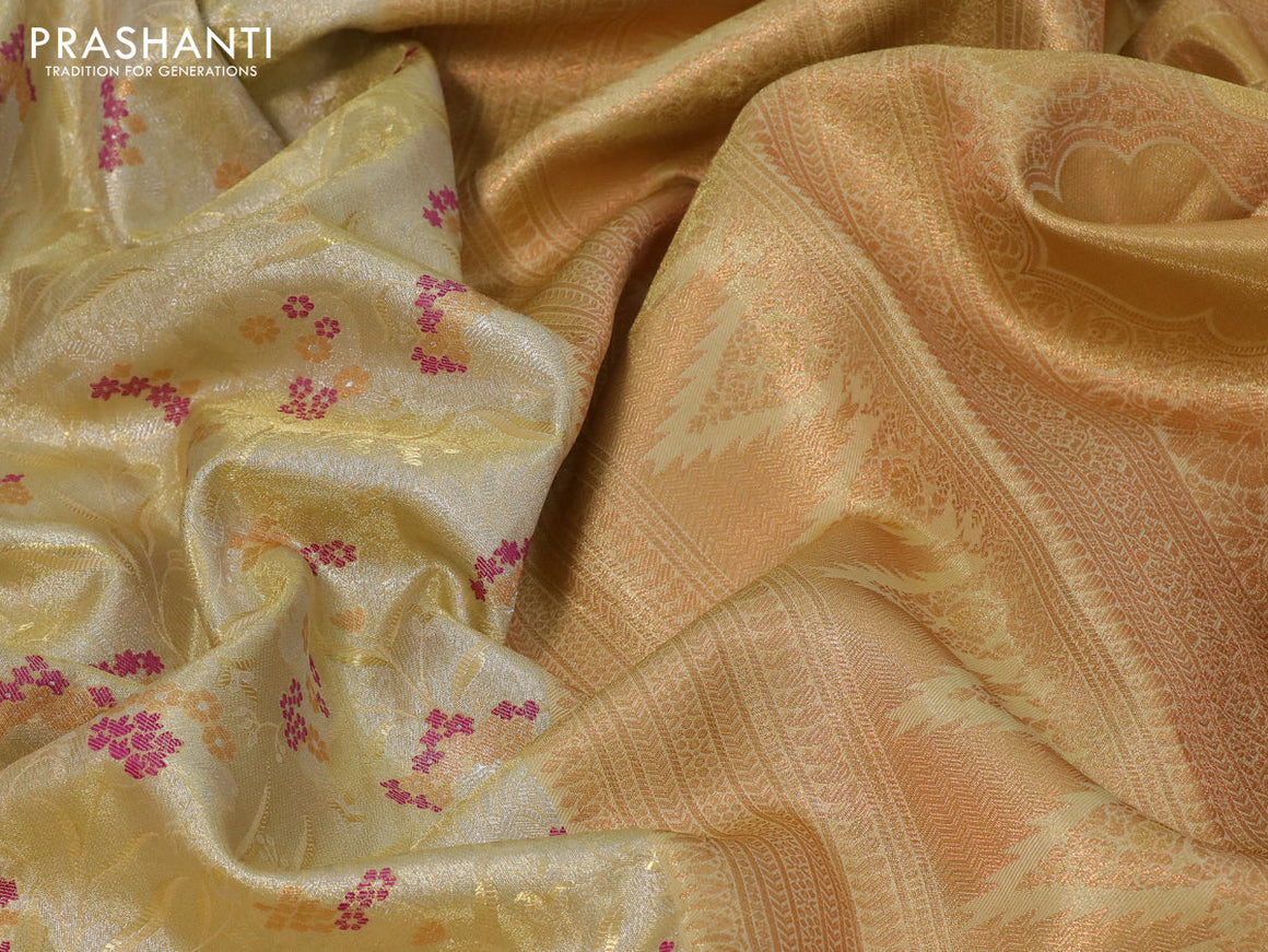 Tissue semi kanjivaram silk saree pale yellow with allover zari woven brocade weaves and temple design zari woven border
