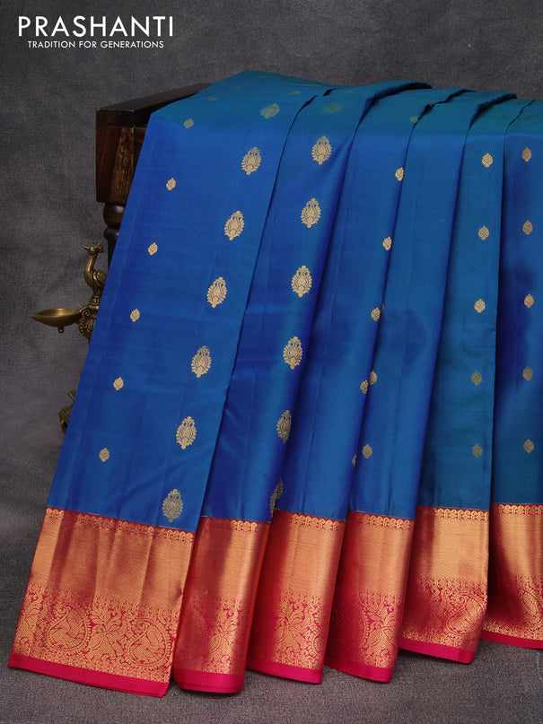 Pure kanjivaram silk saree dual shade of blue and pink with zari woven buttas and zari woven korvai border