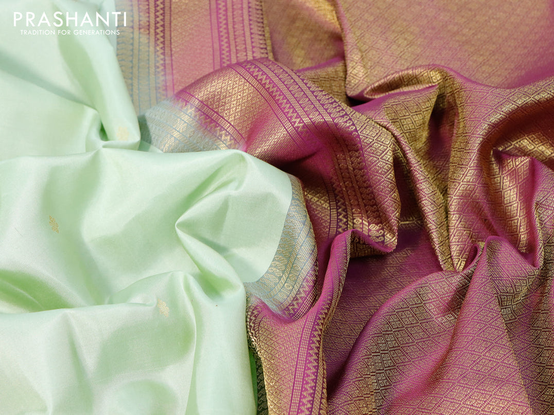 Pure kanjivaram silk saree pista green and purple with zari woven buttas and zari woven korvai border