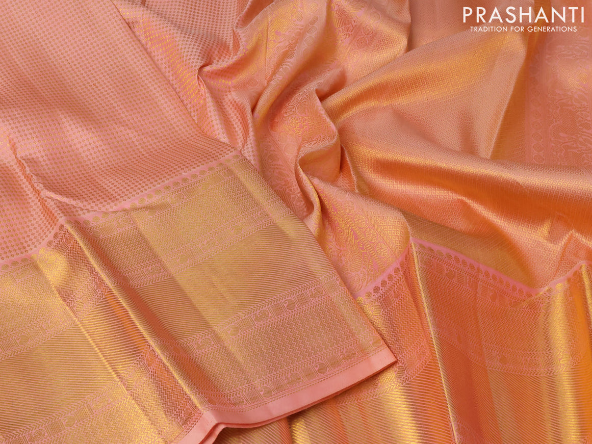 Pure kanjivaram silk saree peach orange with allover zari woven butta weaves and long zari woven border