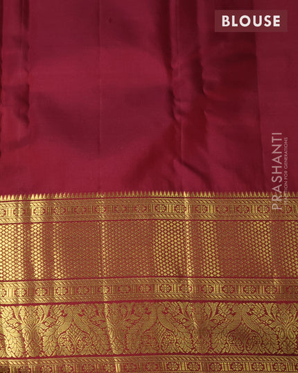 Pure kanjivaram silk saree peach shade and maroon with allover zari wove stripes pattern and temple woven long zari woven border